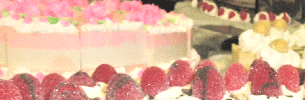 Soap Cakes & Slices by Planet Yum showing pink frosting, red soap berries drizzled with chocolate soap